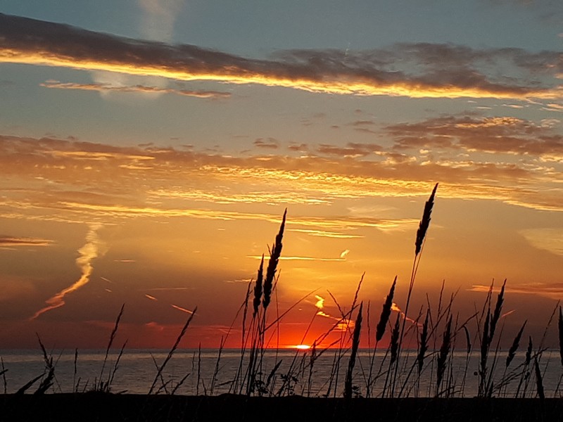 Eckerde Sonnenaufgang am Strand